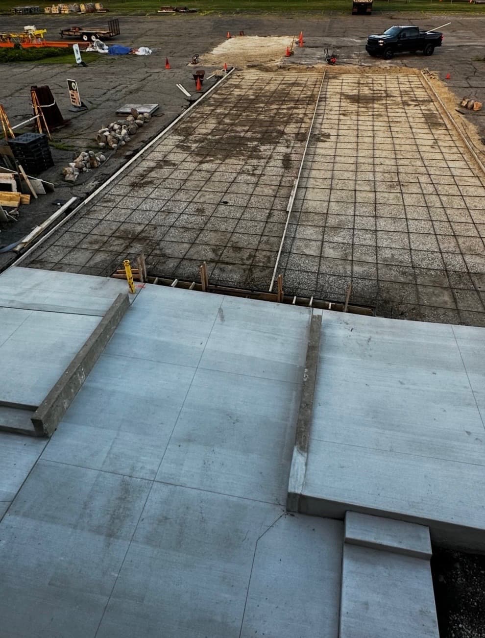 Crew and concrete truck on site